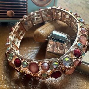 Elegant Gold and Red Gemstone Bracelet